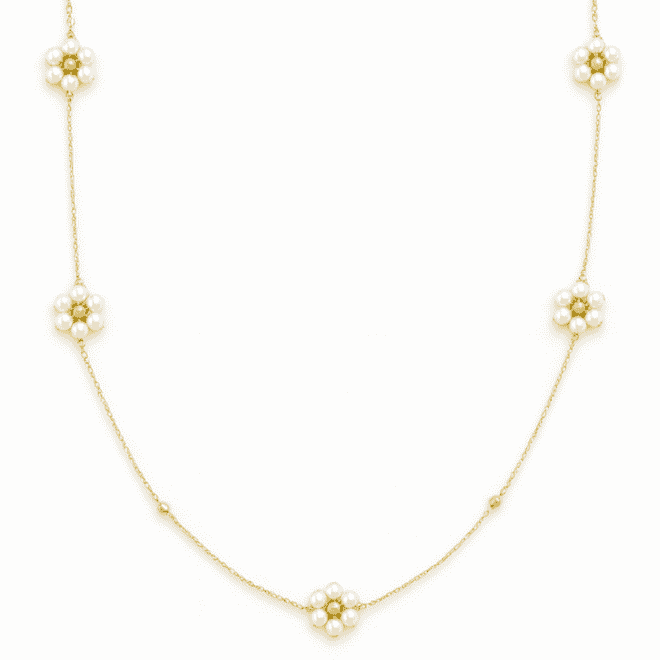 18k yellow gold children’s necklace with Bahraini natural pearls in a floral design.
