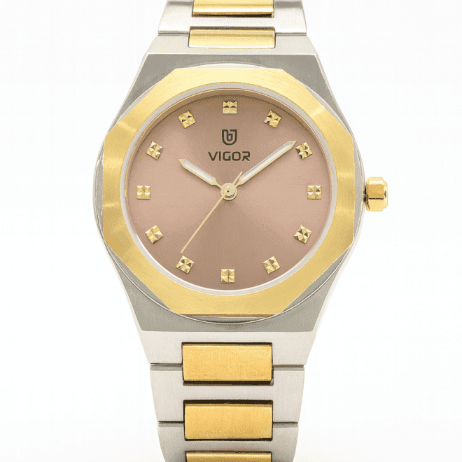 Vigor women’s two-tone silver and gold watch with champagne dial and crystal hour markers, quartz movement, elegant ladies’ design.