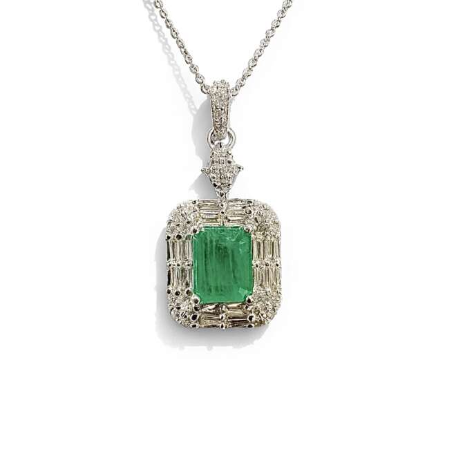 Luxury gold necklace featuring a natural emerald centerpiece surrounded by 0.56 carats of natural diamonds, elegant classic design, shipped worldwide from Dubai.